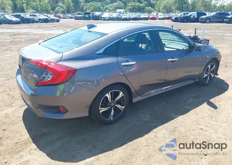 2016 Honda Civic Touring z USA, uszkodzony, nr VIN 2HGFC1F92GH651893